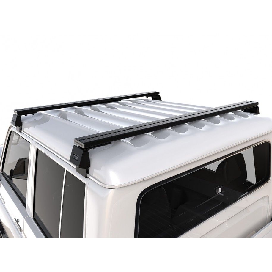 Kit de barres de toit pour une Toyota Hilux DC (1988-1997) / Montage pour gouttière Kit de barres de toit pour une Toyota Hilux DC (1988-1997) / Montage pour gouttière